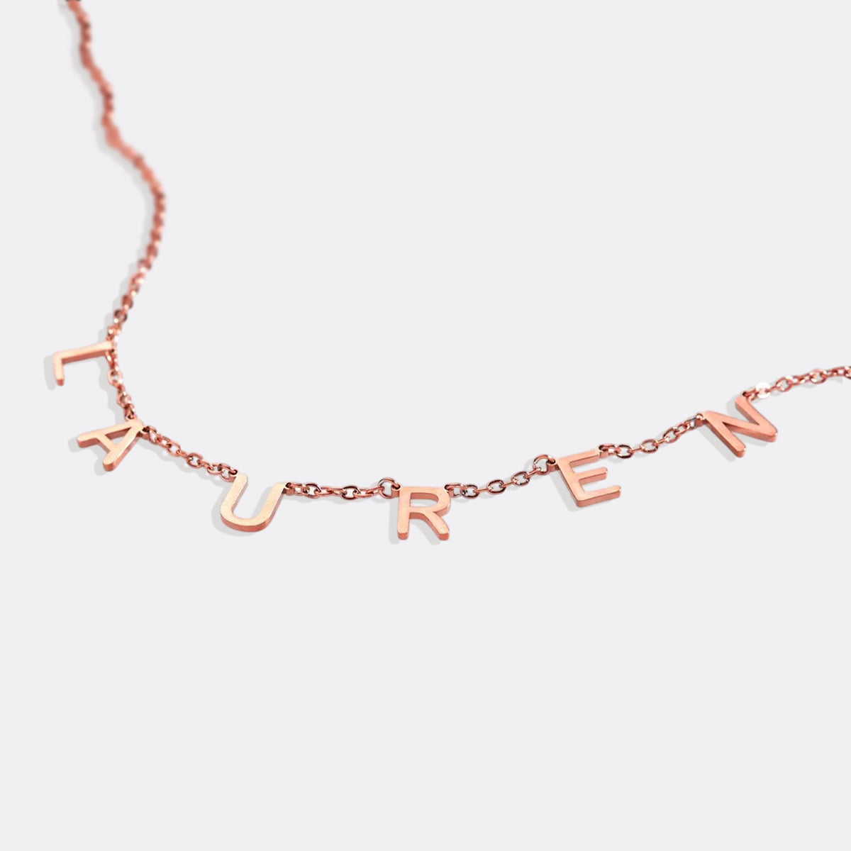 Collar con nombre y letra personalizado