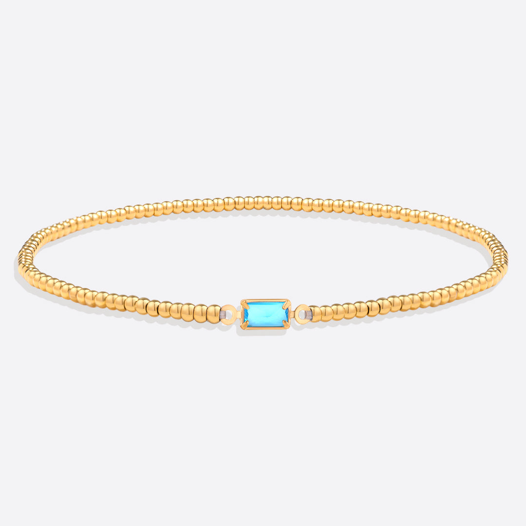 Pulsera de cuentas de oro con piedra natal