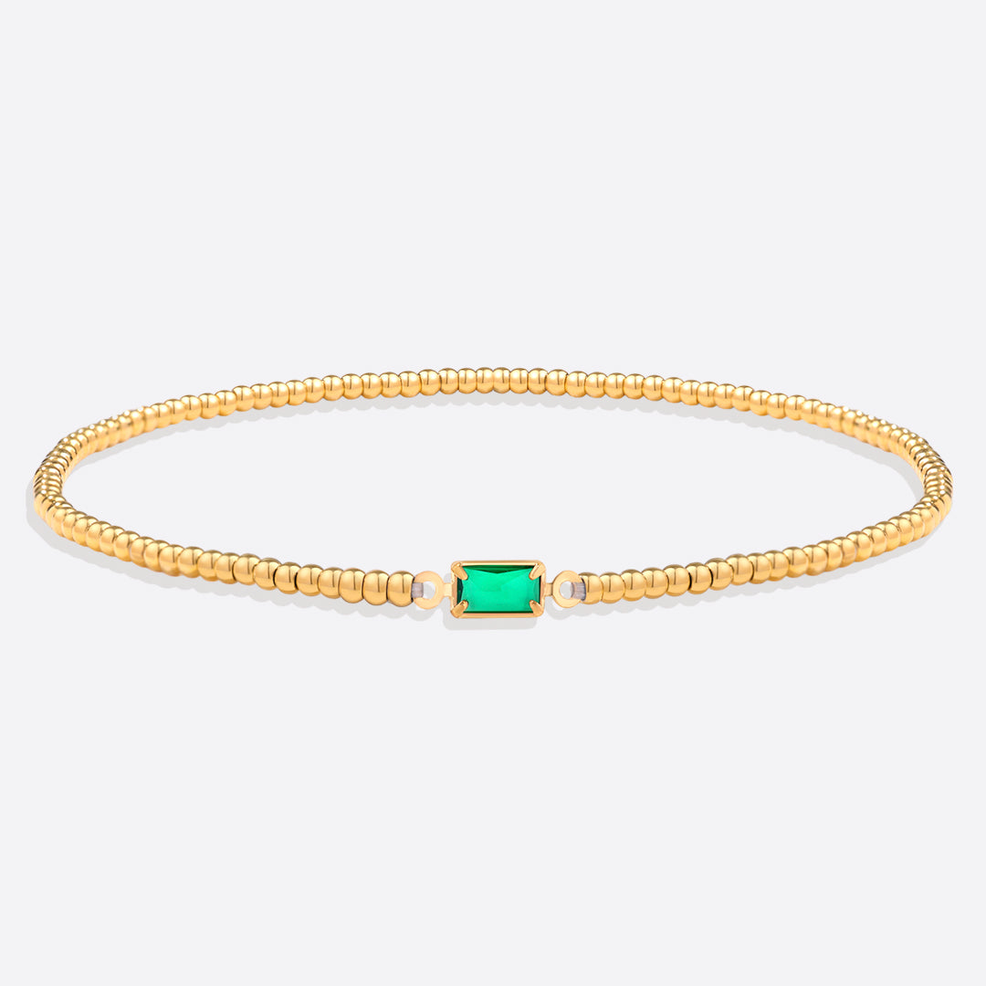 Pulsera de cuentas de oro con piedra natal