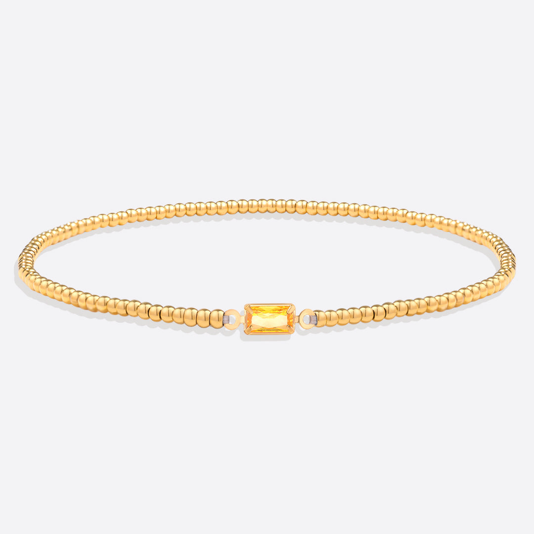 Pulsera de cuentas de oro con piedra natal