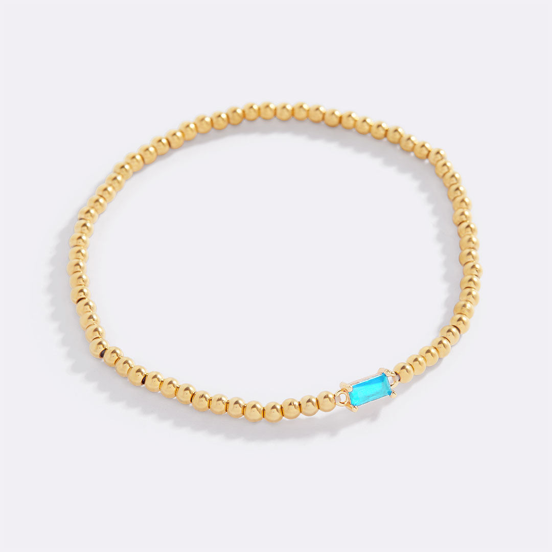 Pulsera de cuentas de oro con piedra natal