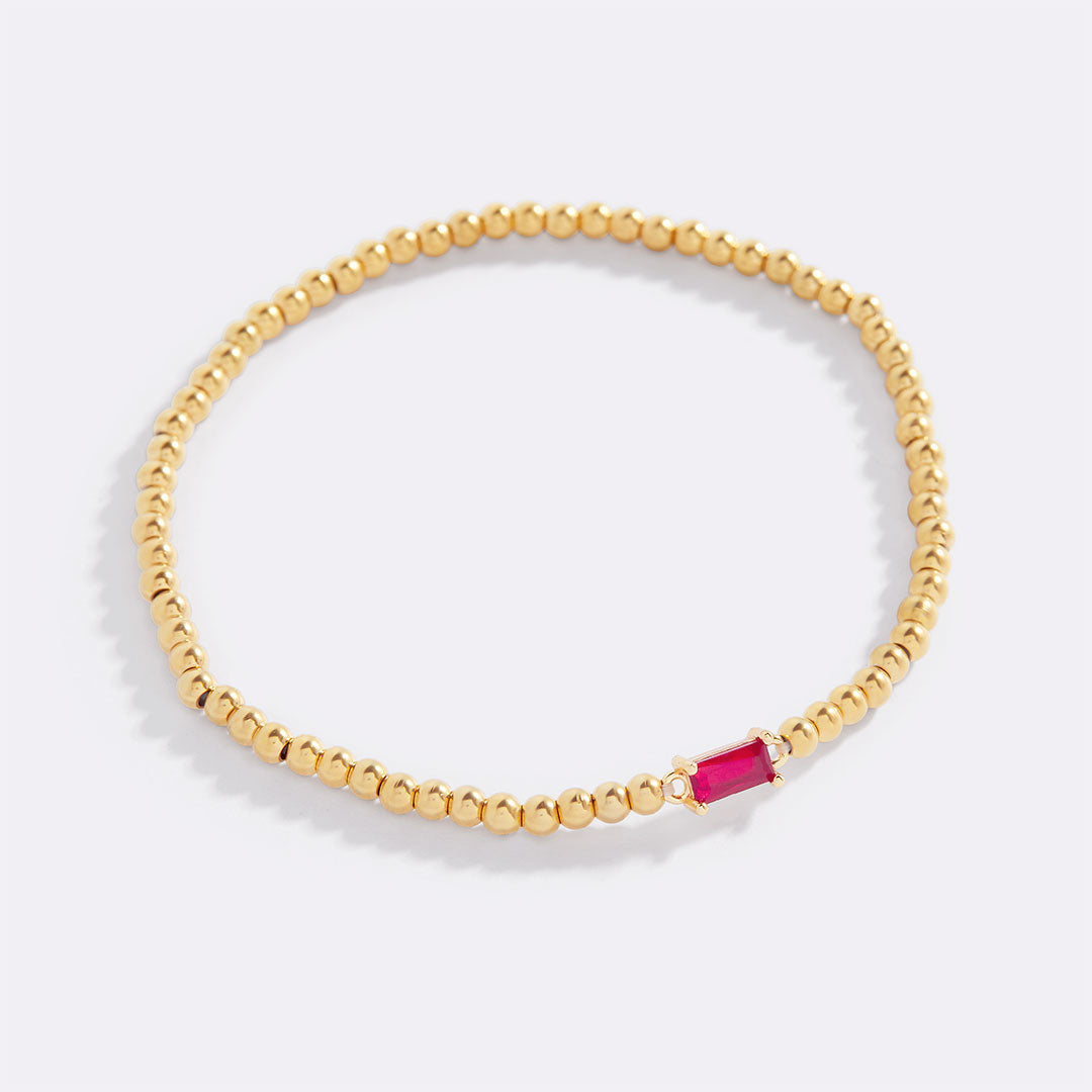 Pulsera de cuentas de oro con piedra natal