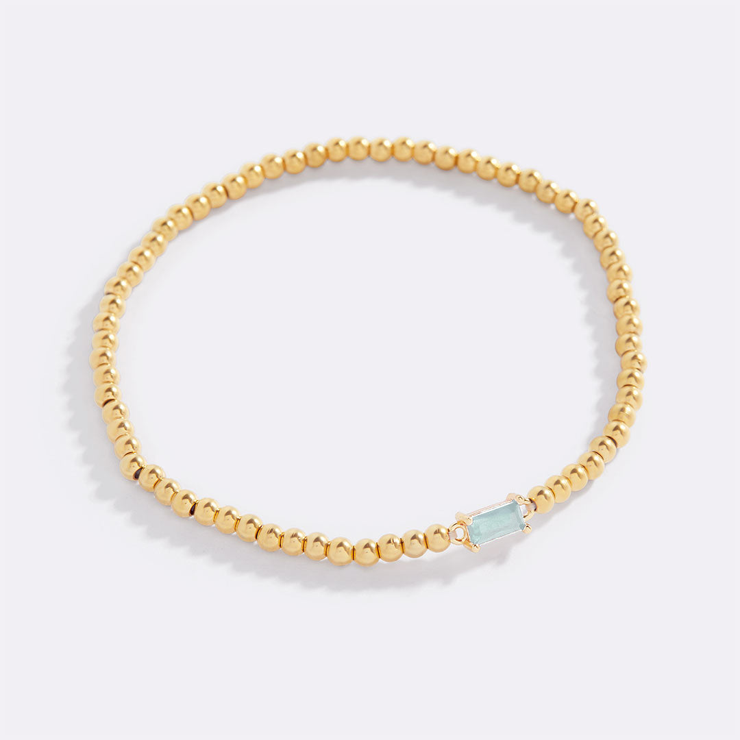 Pulsera de cuentas de oro con piedra natal