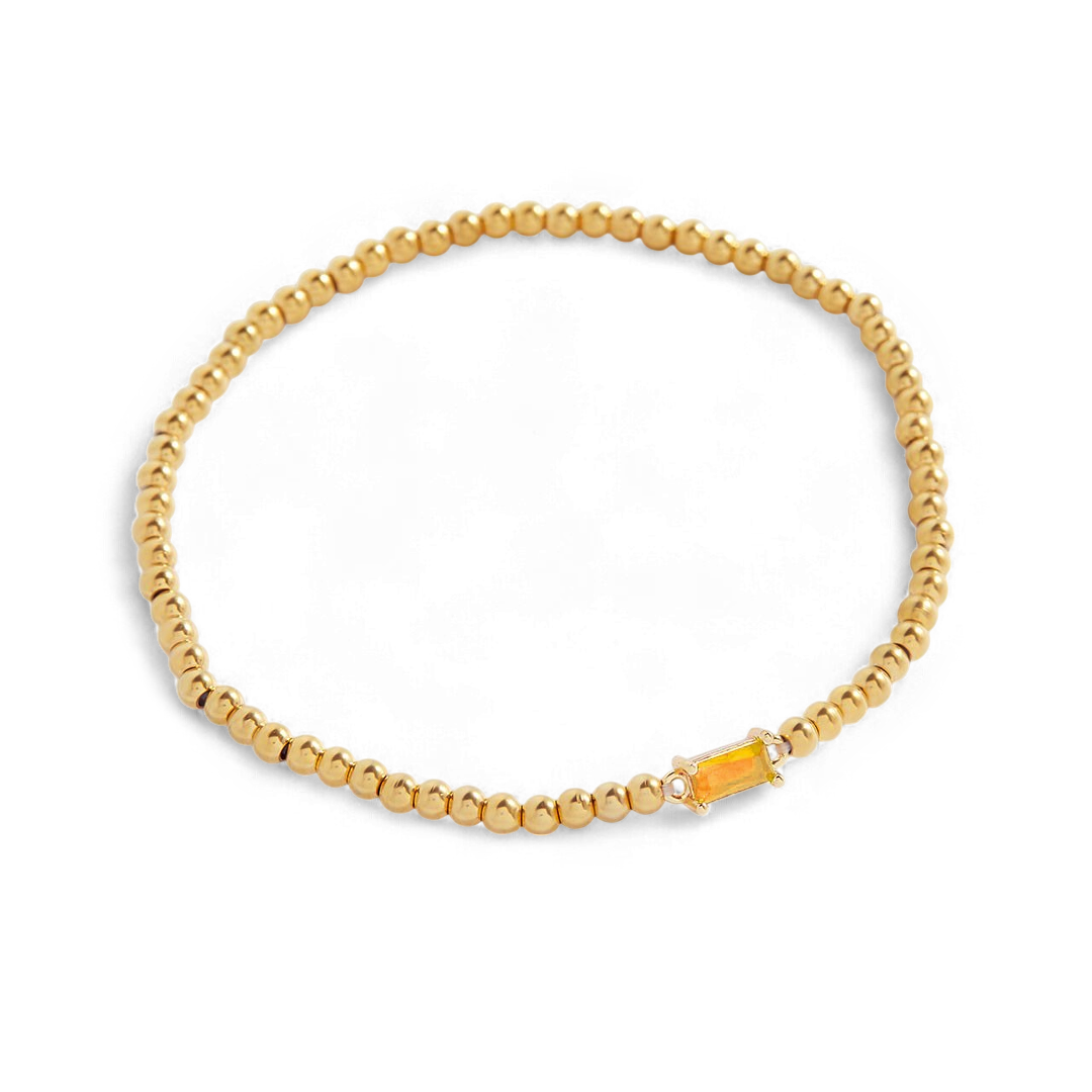 Pulsera de cuentas de oro con piedra natal