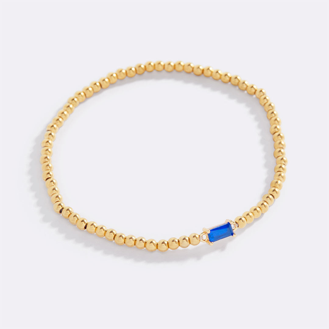 Pulsera de cuentas de oro con piedra natal