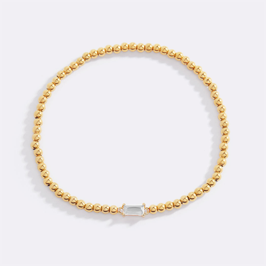 Pulsera de cuentas de oro con piedra natal