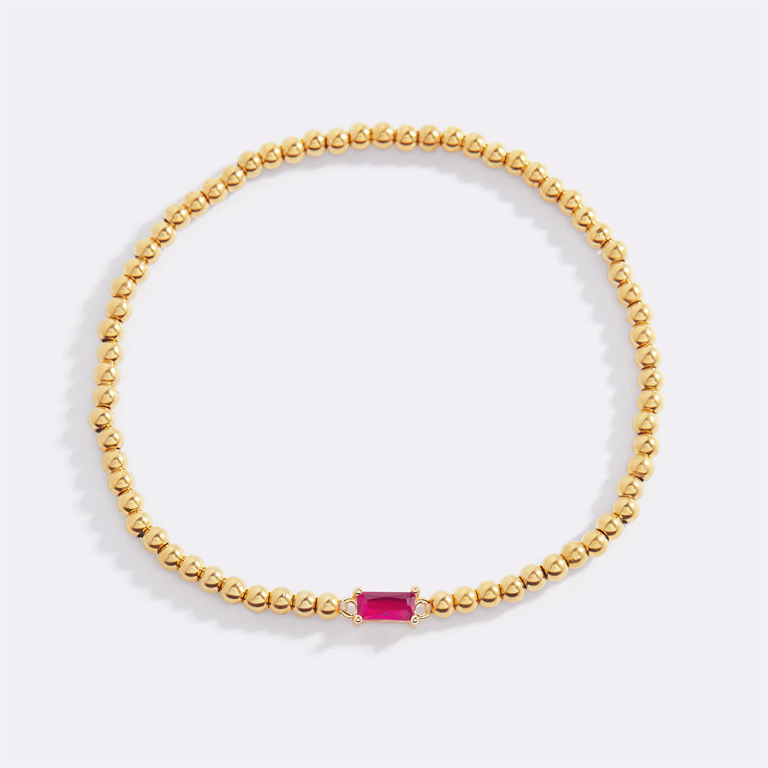 Pulsera de cuentas de oro con piedra natal