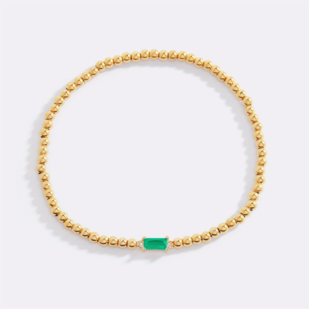 Pulsera de cuentas de oro con piedra natal