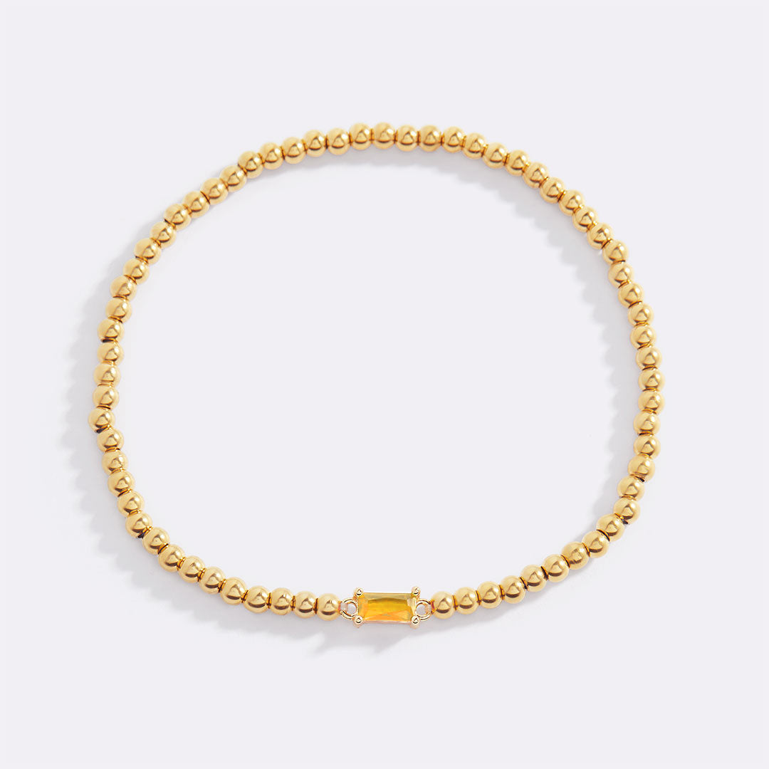 Pulsera de cuentas de oro con piedra natal