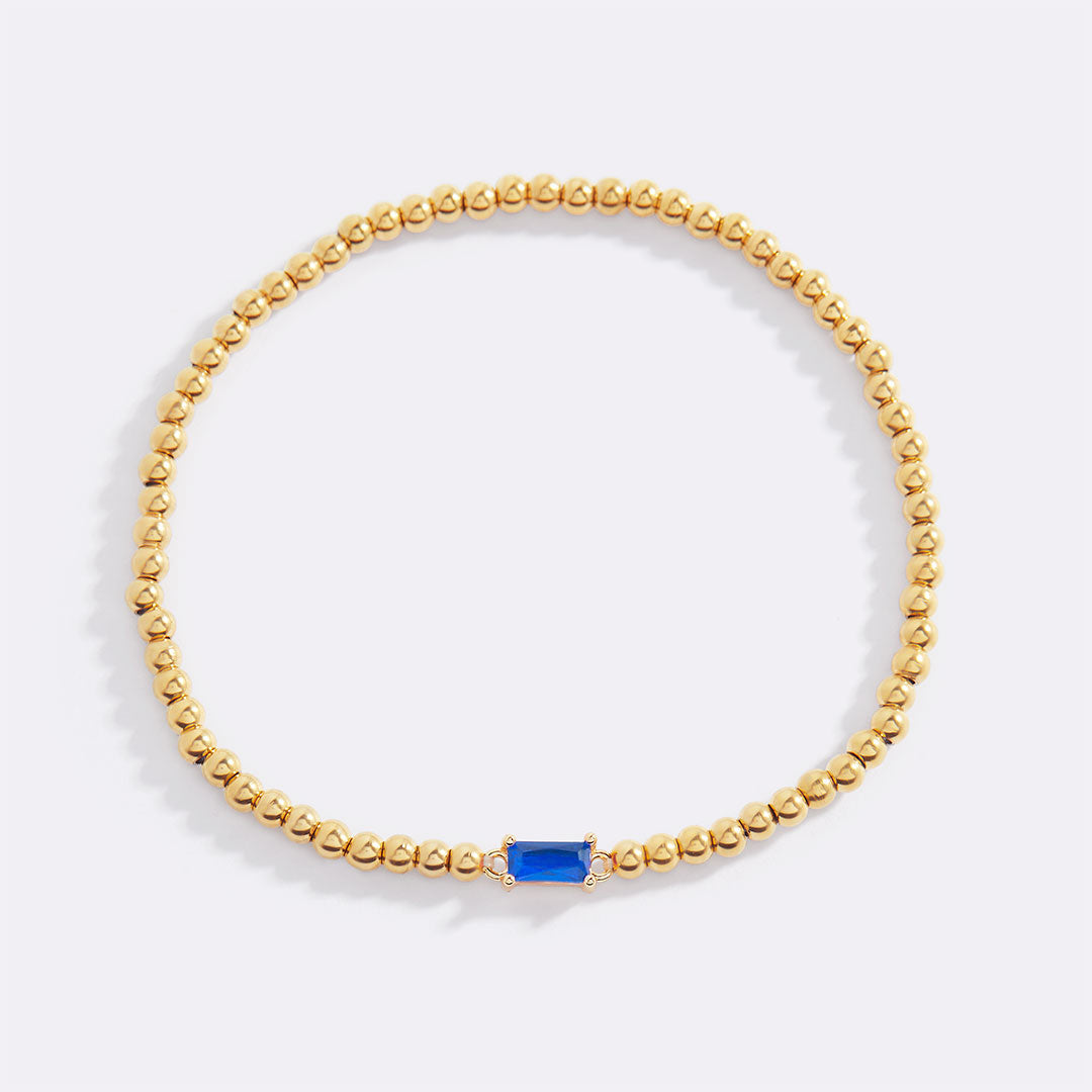 Pulsera de cuentas de oro con piedra natal
