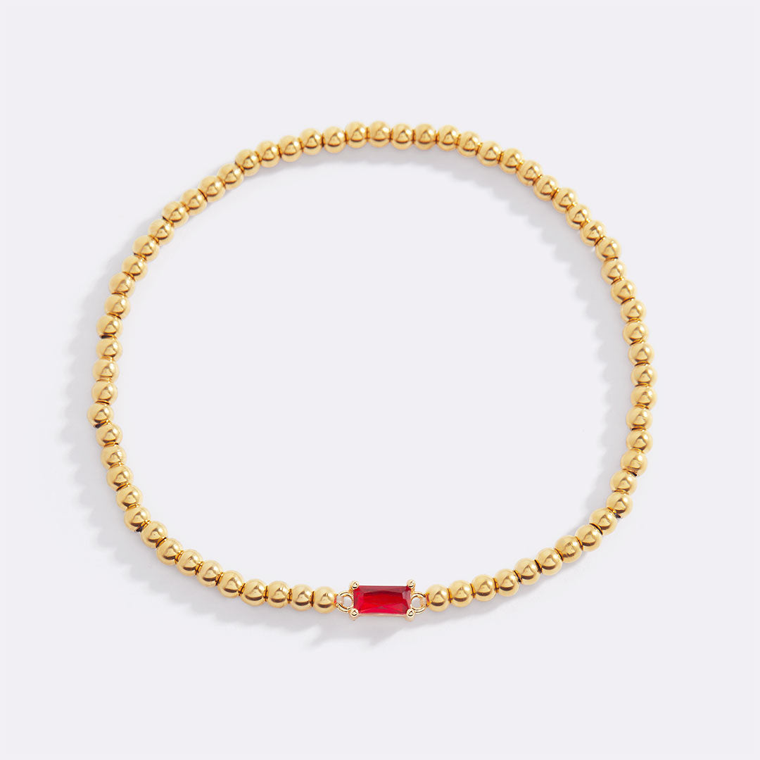 Pulsera de cuentas de oro con piedra natal