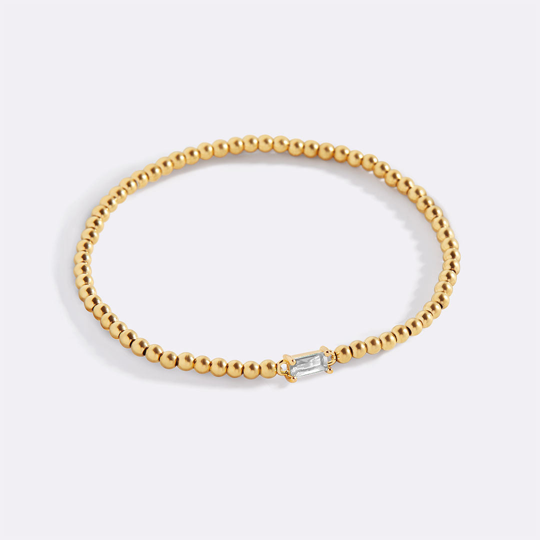 Pulsera de cuentas de oro con piedra natal