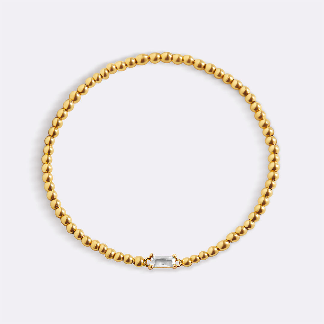 Pulsera de cuentas de oro con piedra natal
