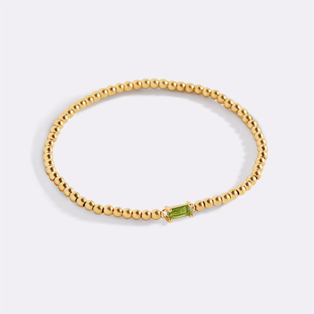 Pulsera de cuentas de oro con piedra natal