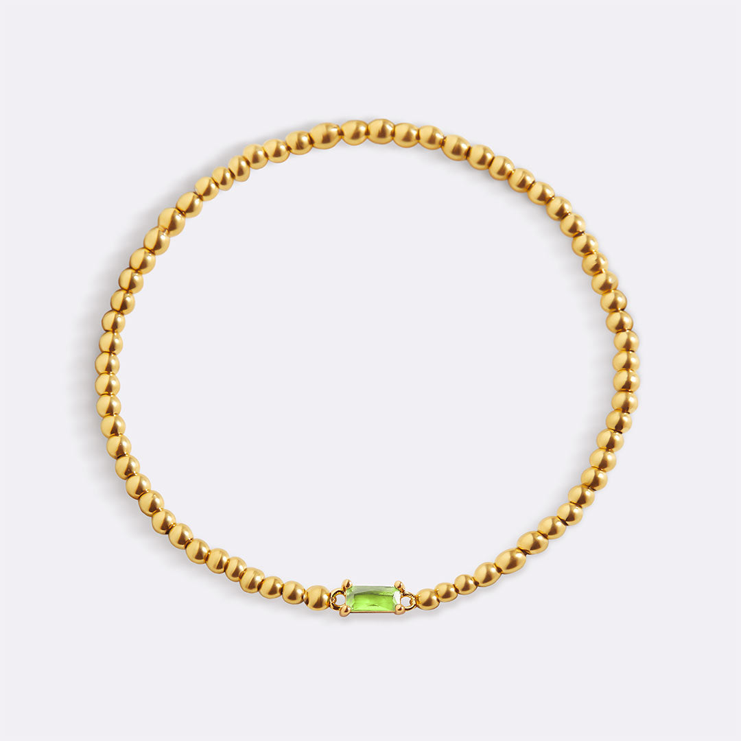 Pulsera de cuentas de oro con piedra natal