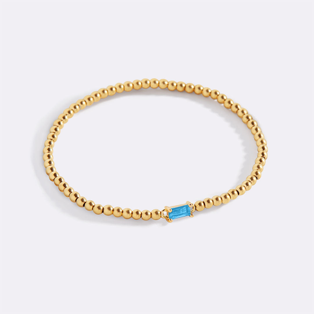 Pulsera de cuentas de oro con piedra natal