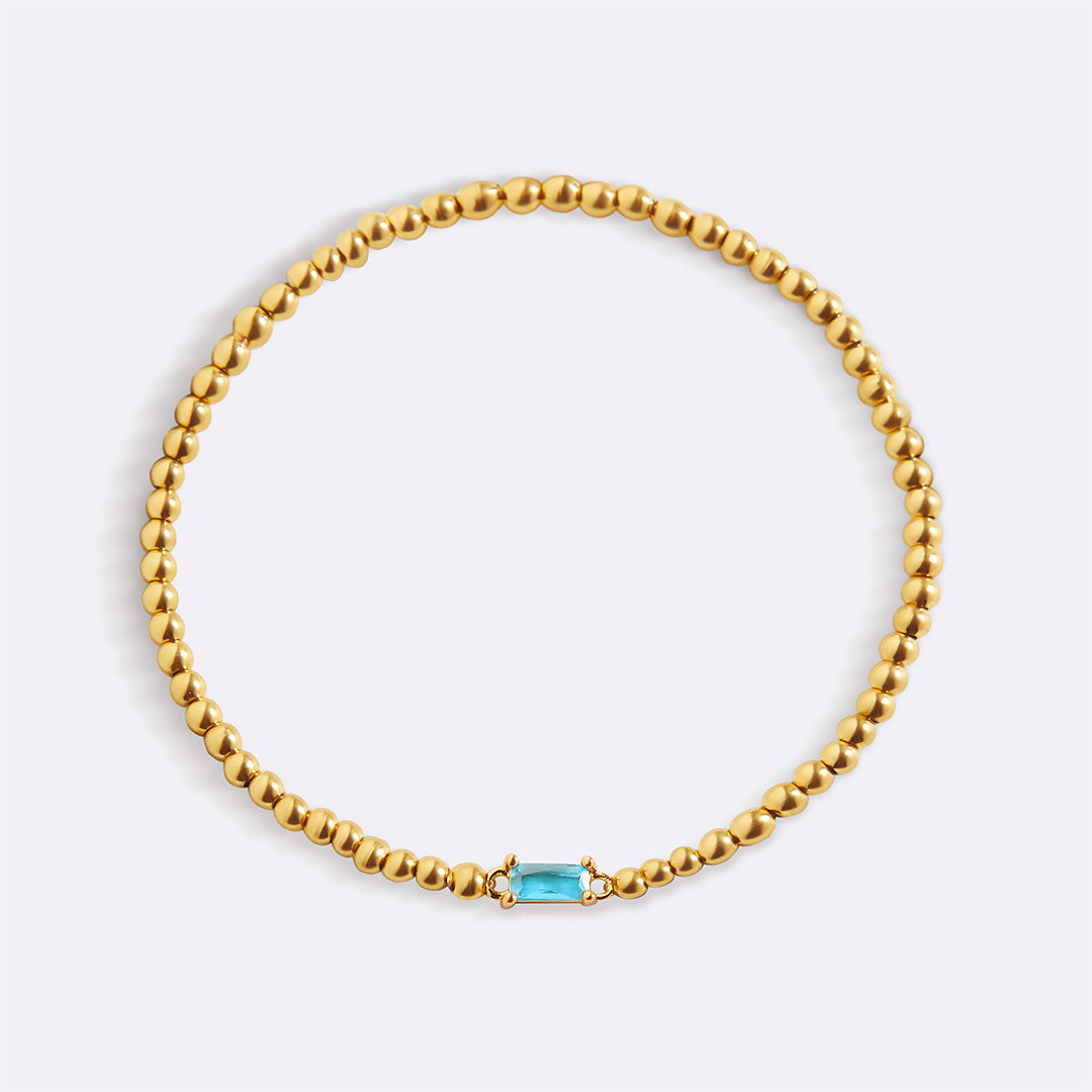 Pulsera de cuentas de oro con piedra natal
