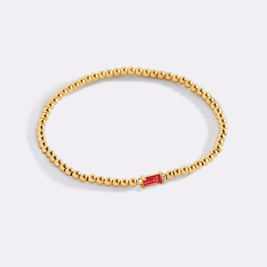 Pulsera de cuentas de oro con piedra natal