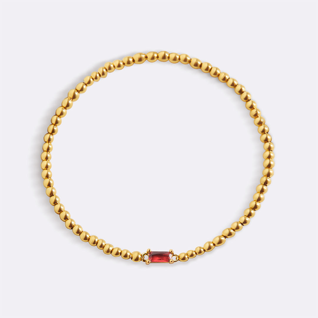 Pulsera de cuentas de oro con piedra natal