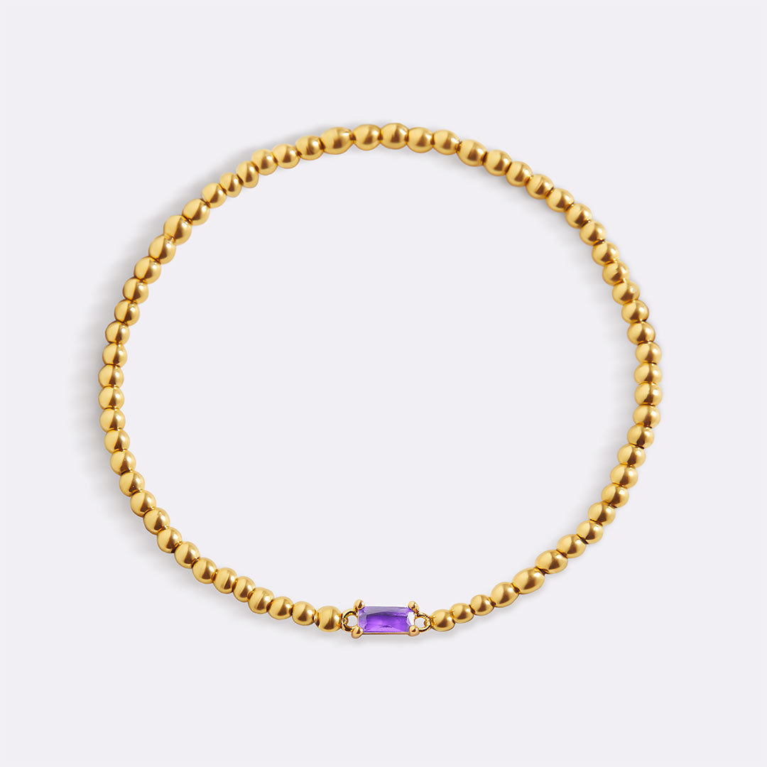 Pulsera de cuentas de oro con piedra natal