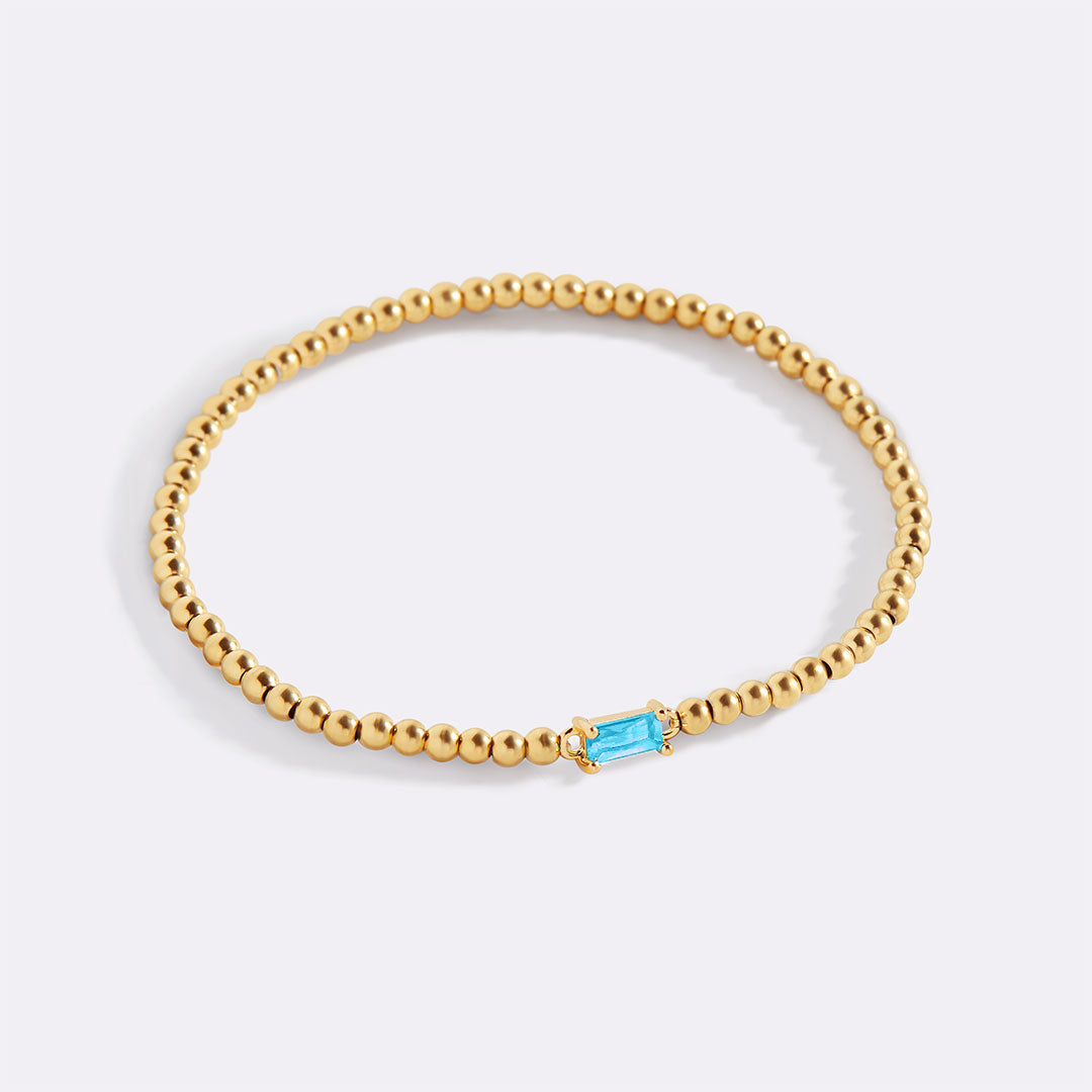 Pulsera de cuentas de oro con piedra natal