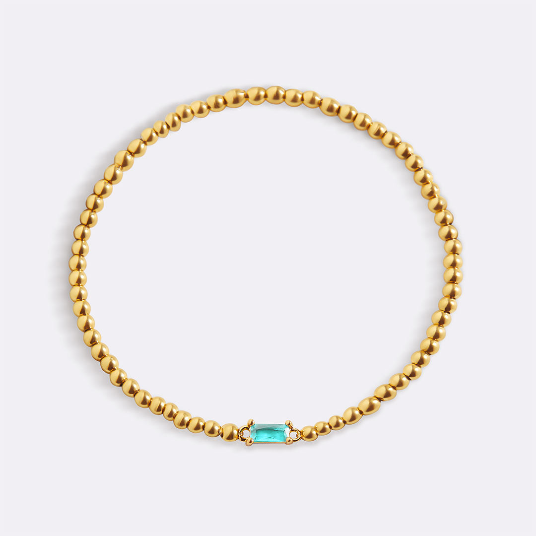 Pulsera de cuentas de oro con piedra natal