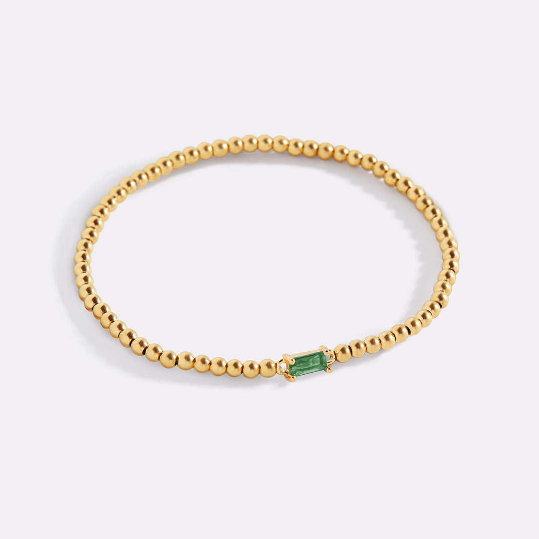 Pulsera de cuentas de oro con piedra natal