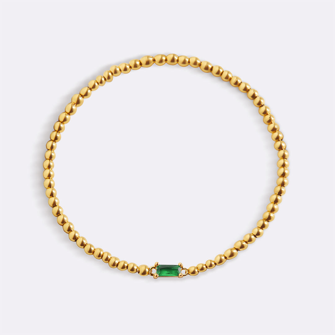 Pulsera de cuentas de oro con piedra natal