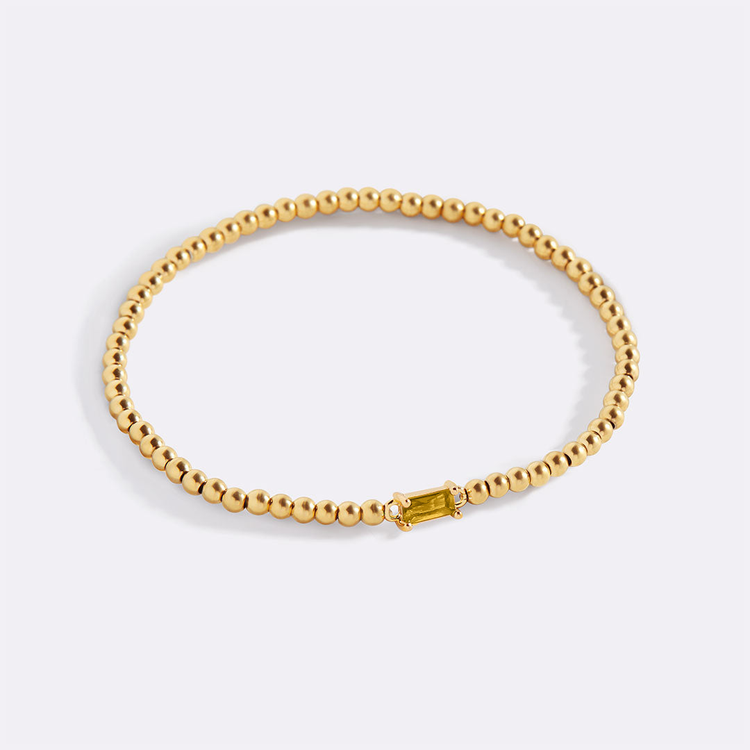 Pulsera de cuentas de oro con piedra natal