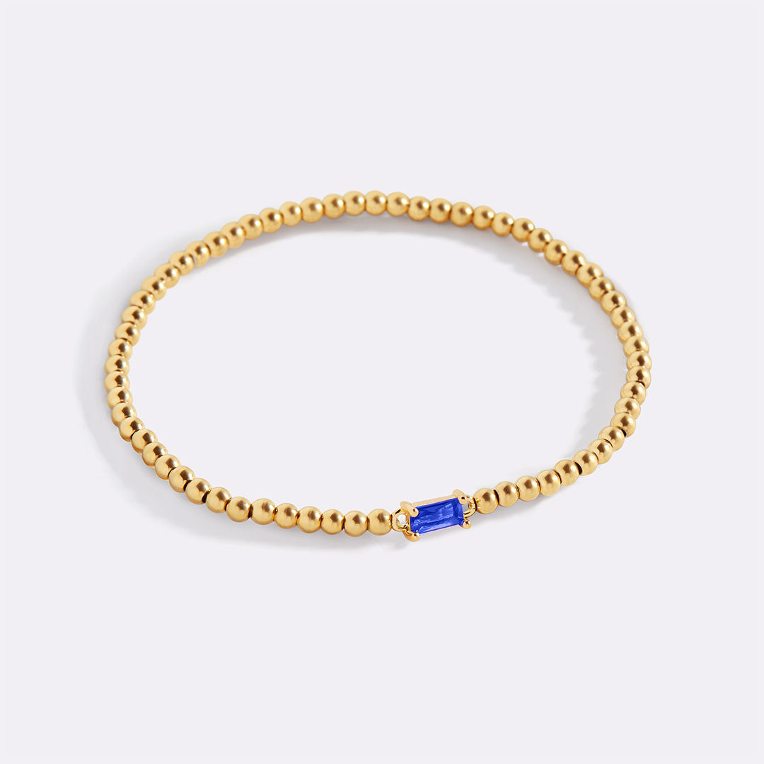 Pulsera de cuentas de oro con piedra natal