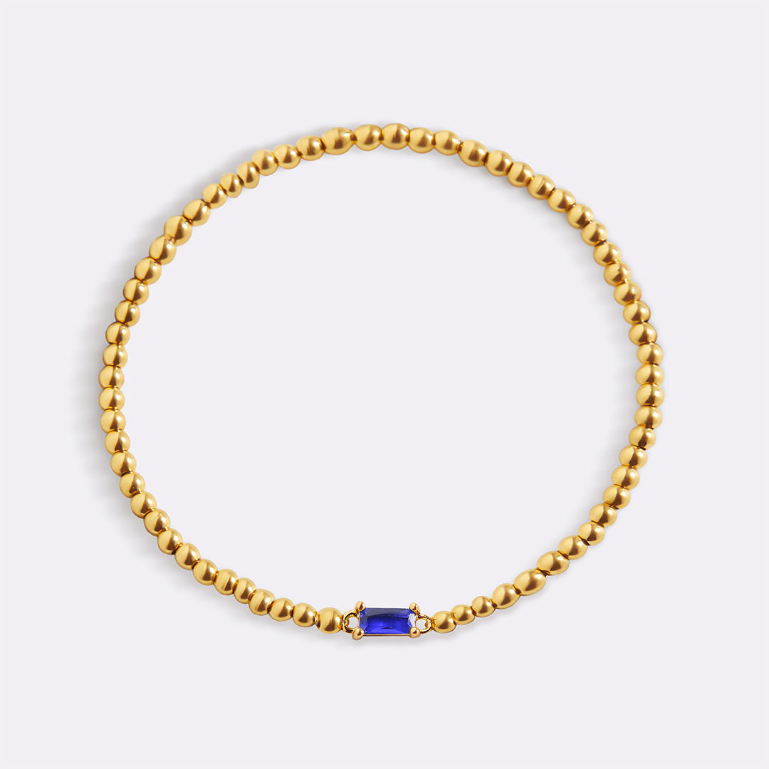 Pulsera de cuentas de oro con piedra natal