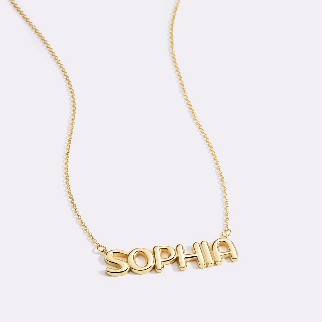 Collar con nombre y globo