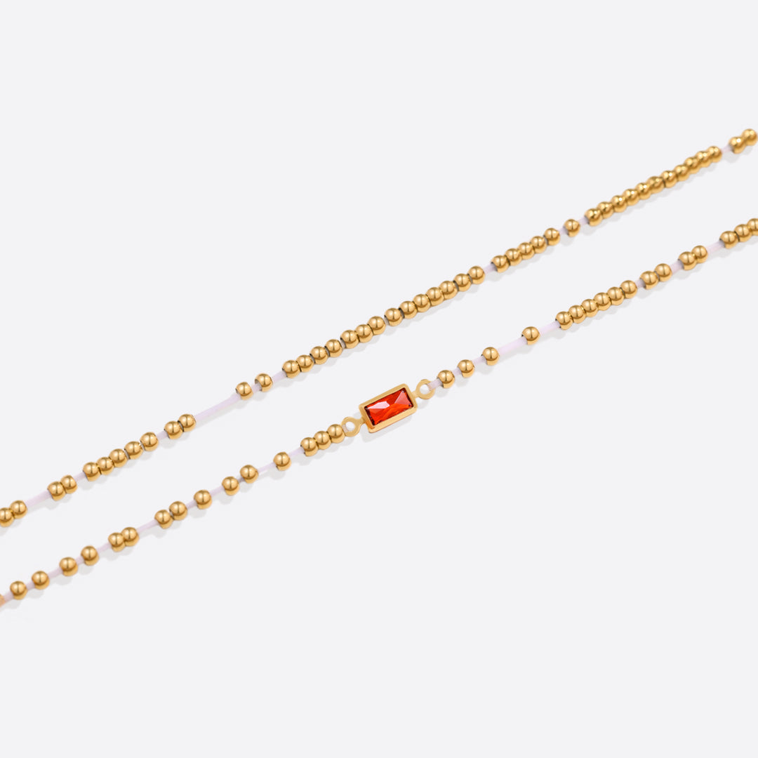 Pulsera de cuentas de oro con piedra natal