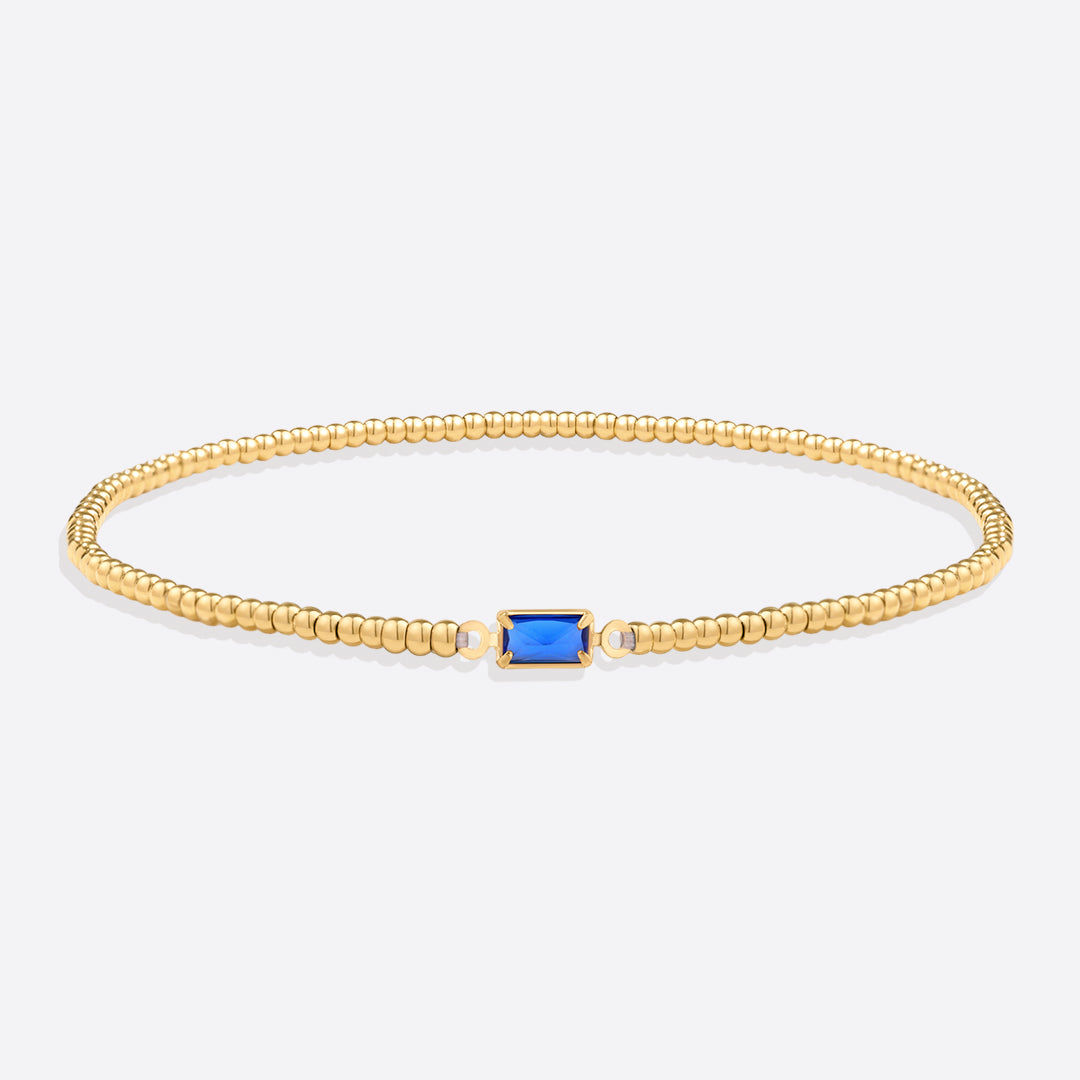 Pulsera de cuentas de oro con piedra natal