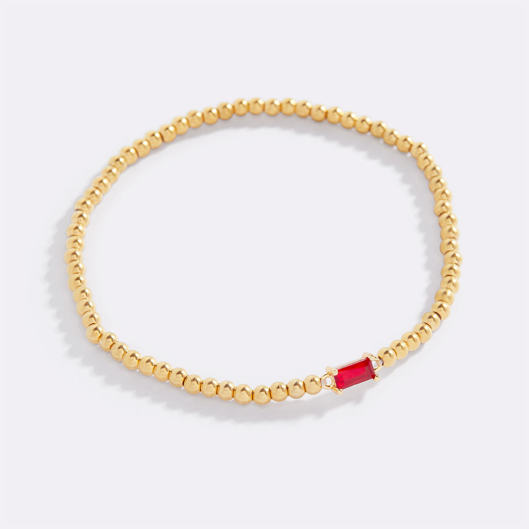 Pulsera de cuentas de oro con piedra natal