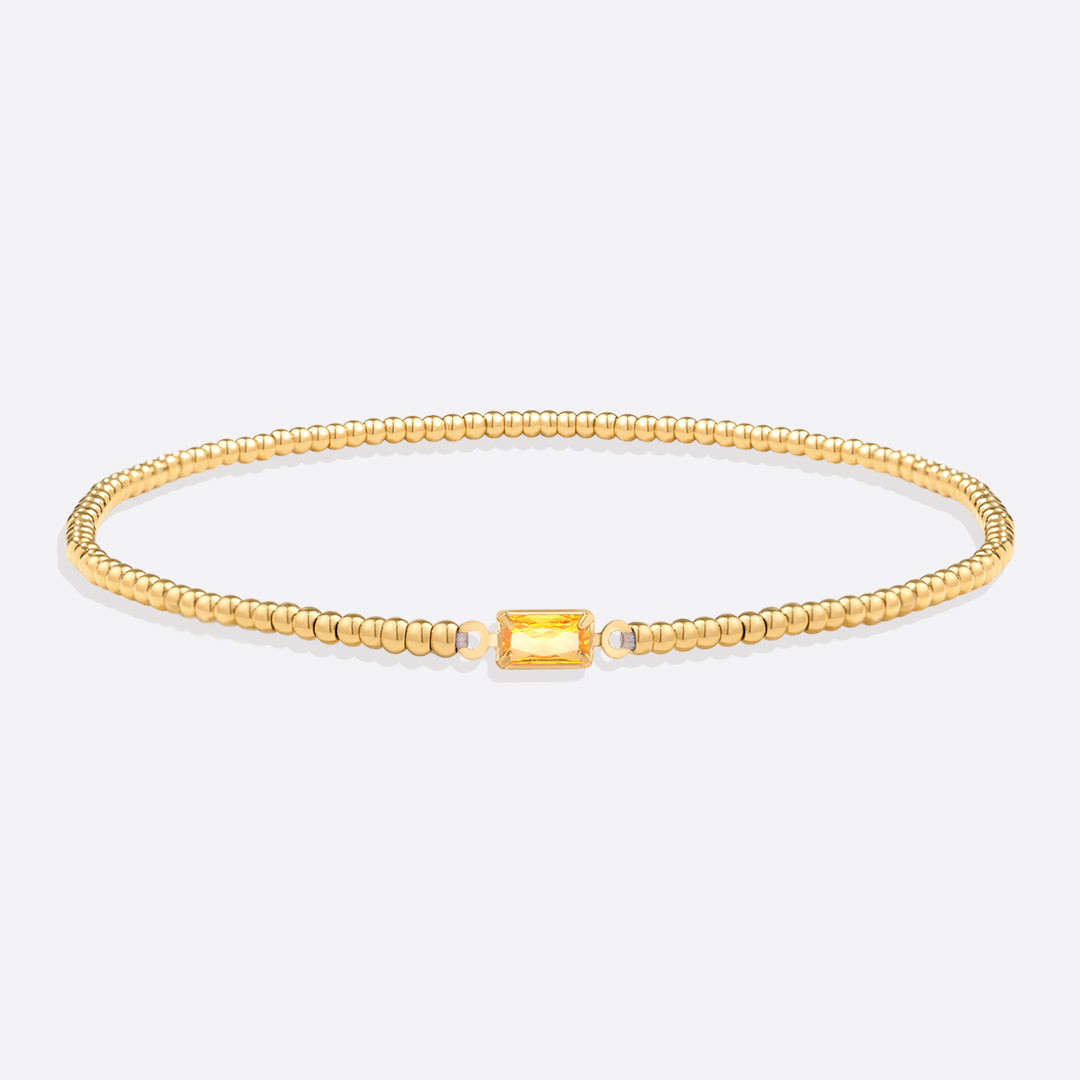 Pulsera de cuentas de oro con piedra natal