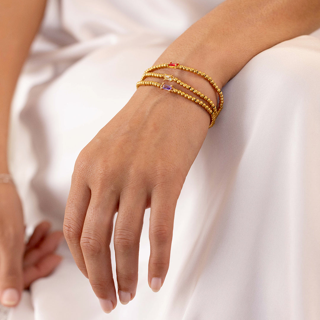 Pulsera de cuentas de oro con piedra natal