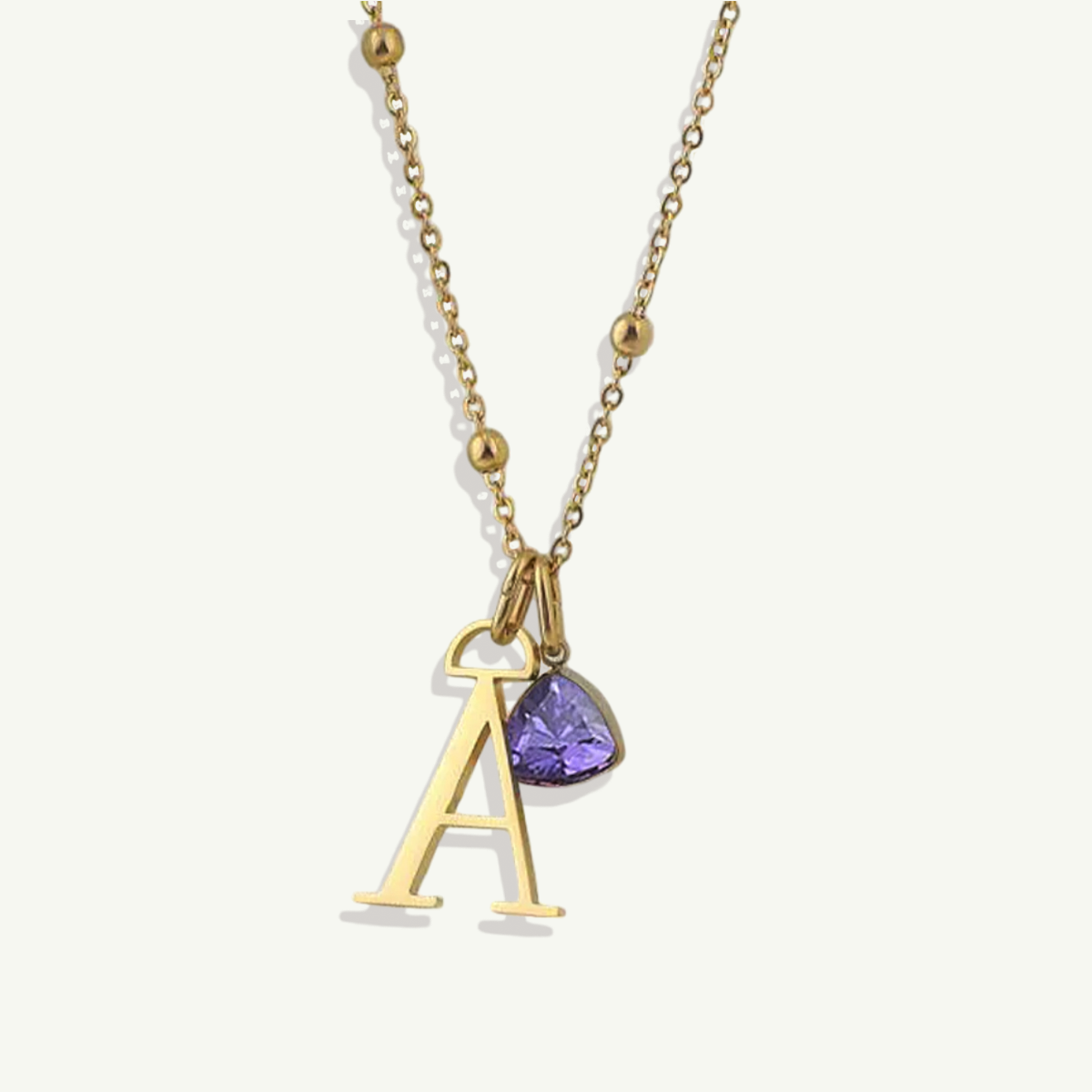 Collar con inicial y gota de piedra natal