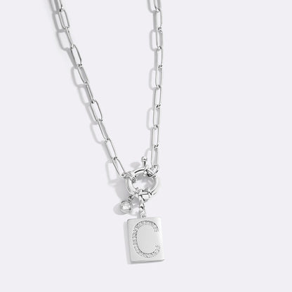 Collar con colgante de inicial pavé y cadena con clip