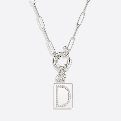 Collar con colgante de inicial pavé y cadena con clip