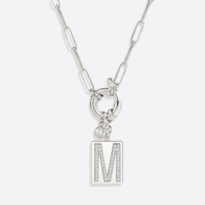 Collar con colgante de inicial pavé y cadena con clip