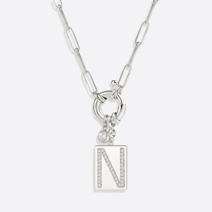 Collar con colgante de inicial pavé y cadena con clip