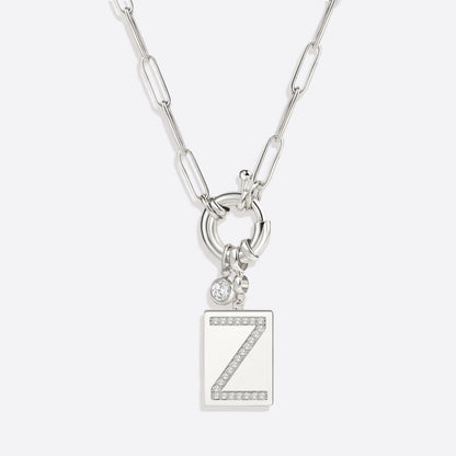 Collar con colgante de inicial pavé y cadena con clip